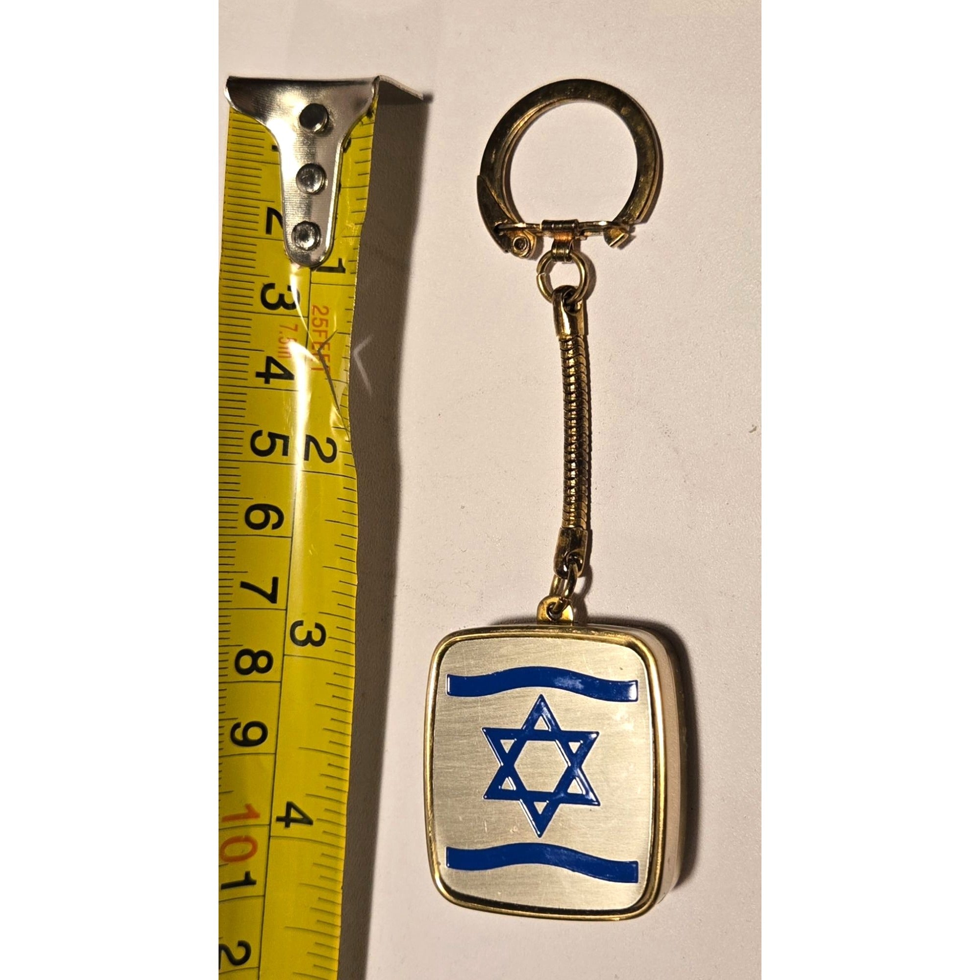 Vintage Brushed brass music box keychain, brand Clover, Jewish Star of David, plays Hava Nagila