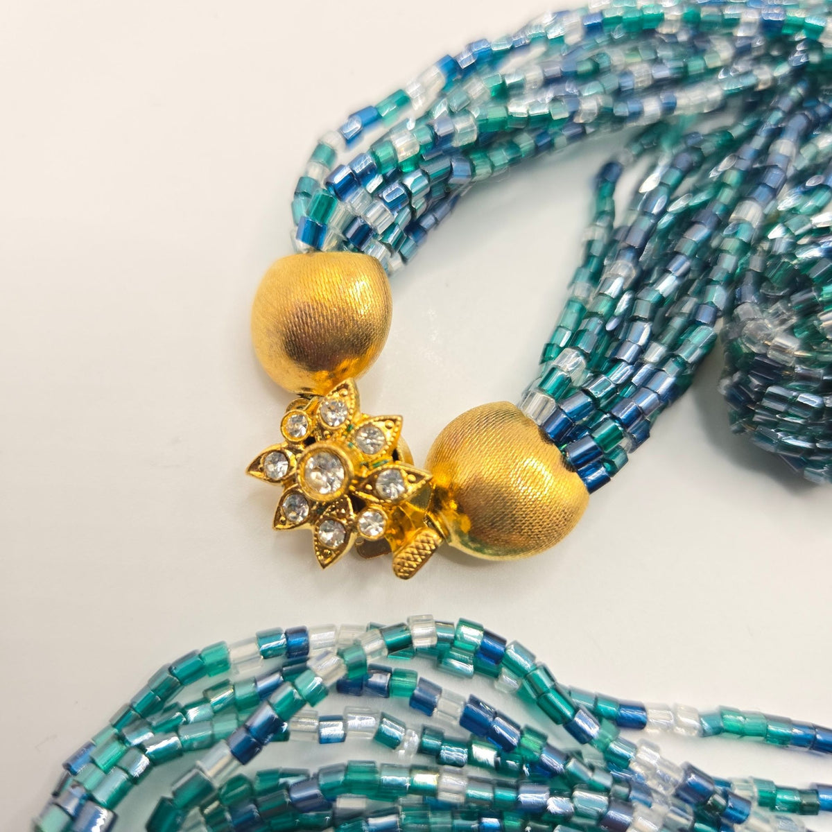 Multistrand Beaded Necklace & Clip-On Earrings Set With Gold-Tone Embellishments And Rhinestone Accent