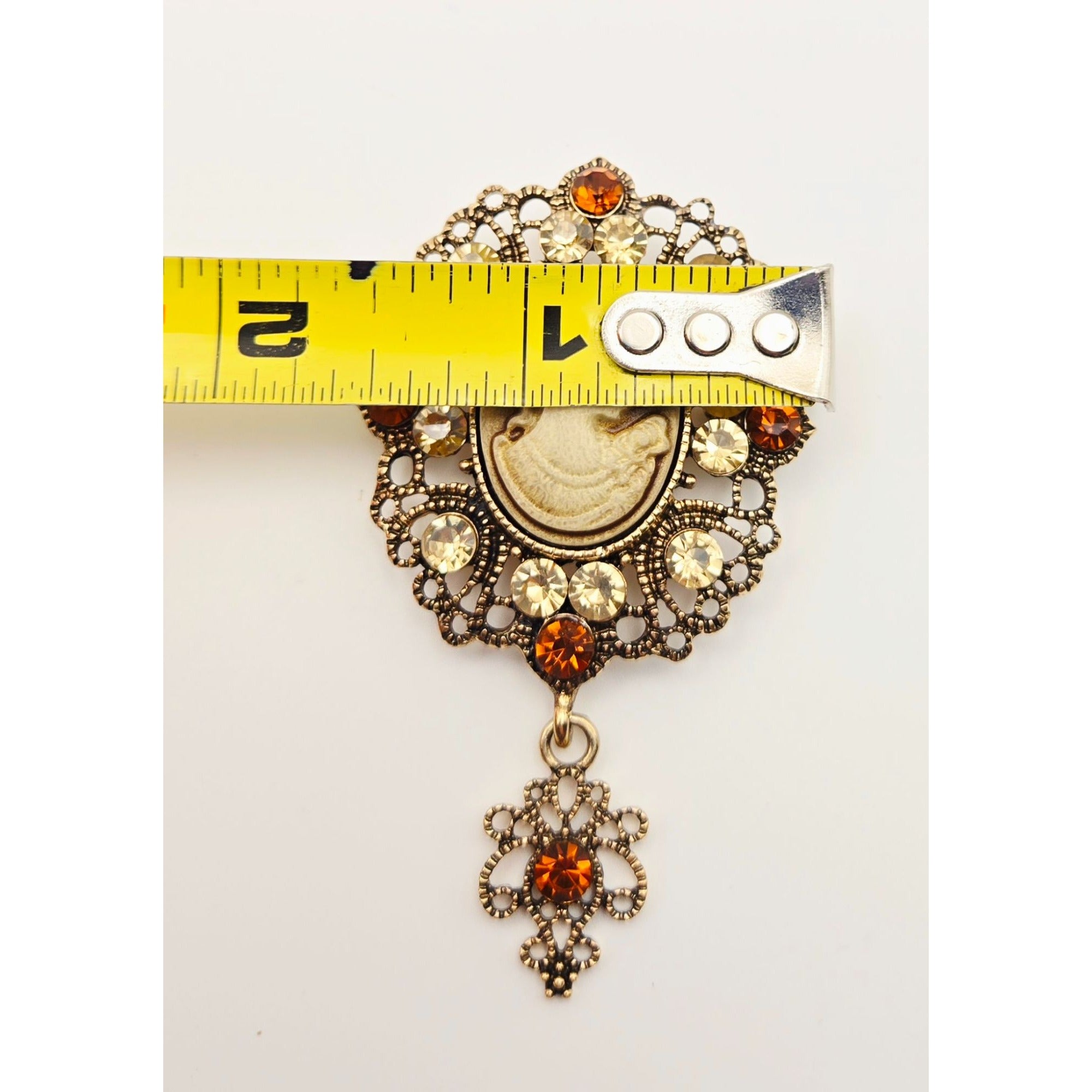 Vintage Cameo Brooch With Rhinestones & Dangling Accent - Ornate Antique Gold-Tone Finish Amber & Clear Details 2.5" x 1.75"