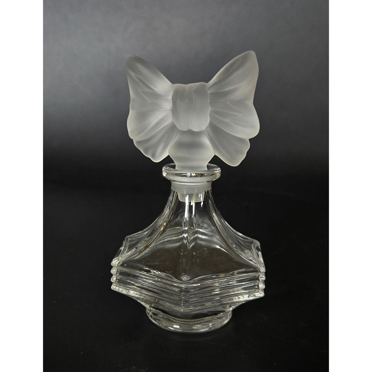 Vintage Glass Perfume Bottle With Frosted Bow Stopper Hexagonal Base 4 Inches Tall