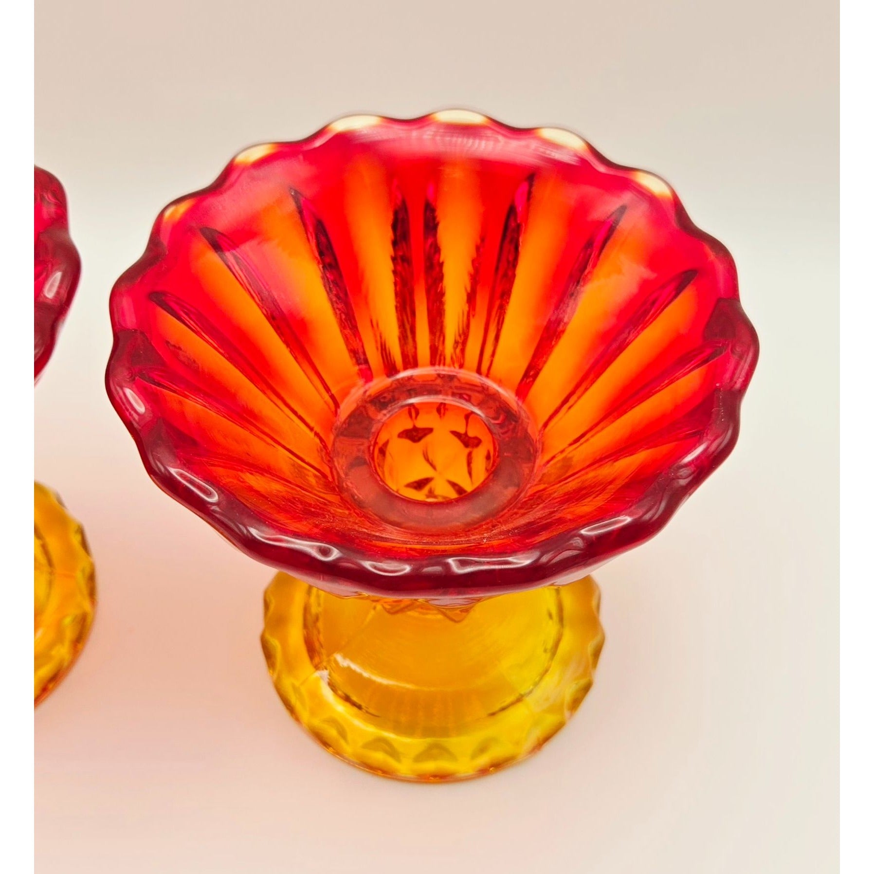 Pair of Indiana Glass Red, Amberina Glass Candleholders W/Scalloped Rims