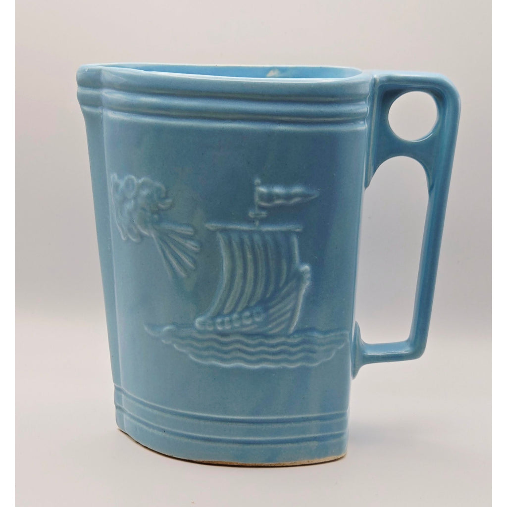 Vintage Ransbottom Blue Pottery Pitcher With Embossed Viking Ship & Wind Face Design