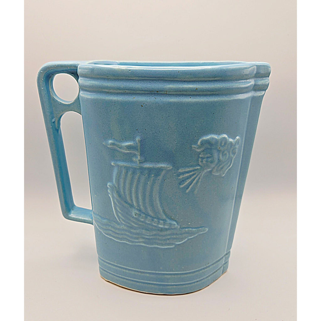 Vintage Ransbottom Blue Pottery Pitcher With Embossed Viking Ship & Wind Face Design