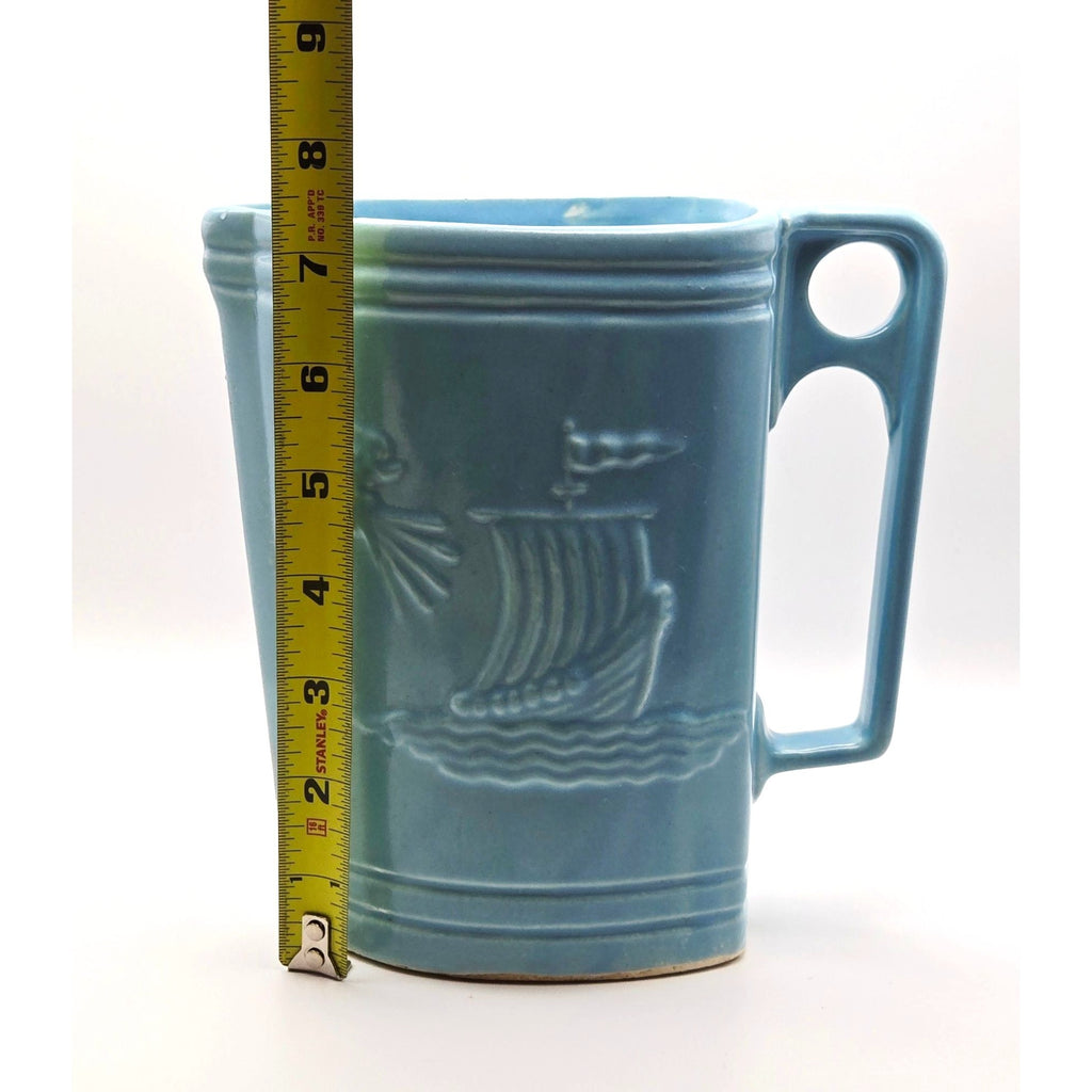 Vintage Ransbottom Blue Pottery Pitcher With Embossed Viking Ship & Wind Face Design