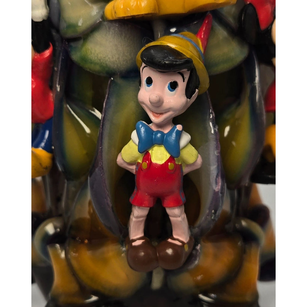 Disney-Themed Ribbon Candle Featuring Mickey Minnie Pluto & Pinocchio Characters In Multicolor Design