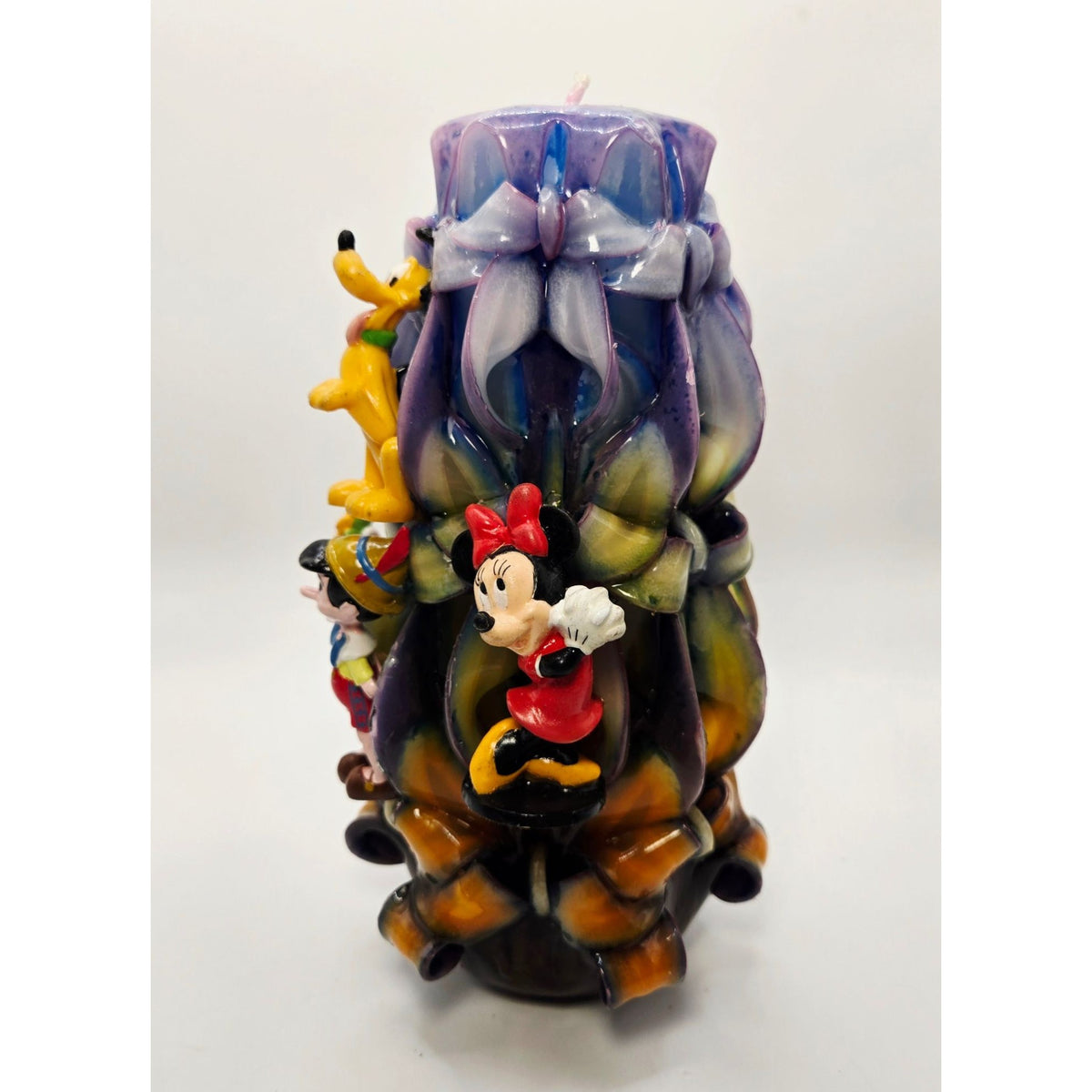 Disney-Themed Ribbon Candle Featuring Mickey Minnie Pluto & Pinocchio Characters In Multicolor Design